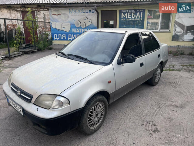 Серый Сузуки Свифт, объемом двигателя 1.3 л и пробегом 157 тыс. км за 800 $, фото 3 на Automoto.ua