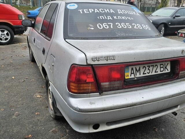 Серый Сузуки Свифт, объемом двигателя 1.3 л и пробегом 234 тыс. км за 550 $, фото 4 на Automoto.ua