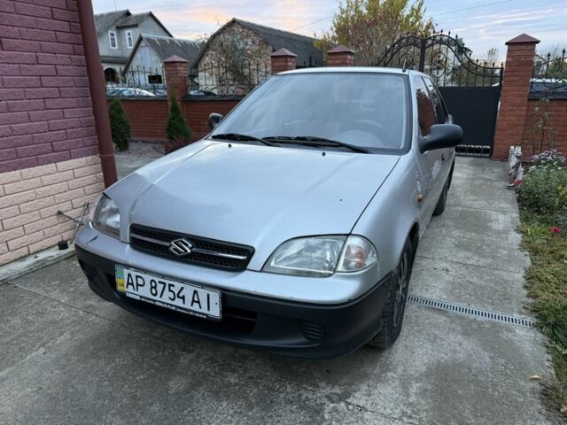 Сірий Сузукі Свифт, об'ємом двигуна 1.3 л та пробігом 222 тис. км за 1350 $, фото 2 на Automoto.ua