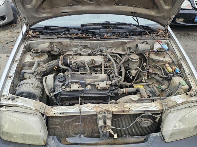 Серый Сузуки Свифт, объемом двигателя 1.3 л и пробегом 234 тыс. км за 550 $, фото 6 на Automoto.ua