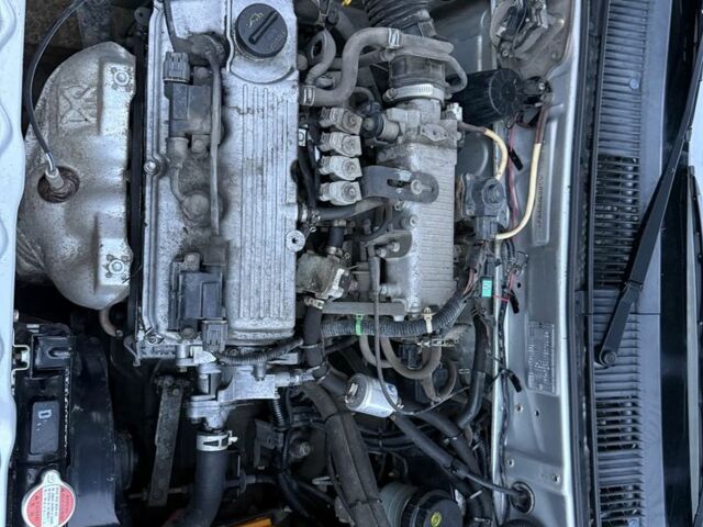 Сірий Сузукі Свифт, об'ємом двигуна 1.3 л та пробігом 222 тис. км за 1350 $, фото 6 на Automoto.ua