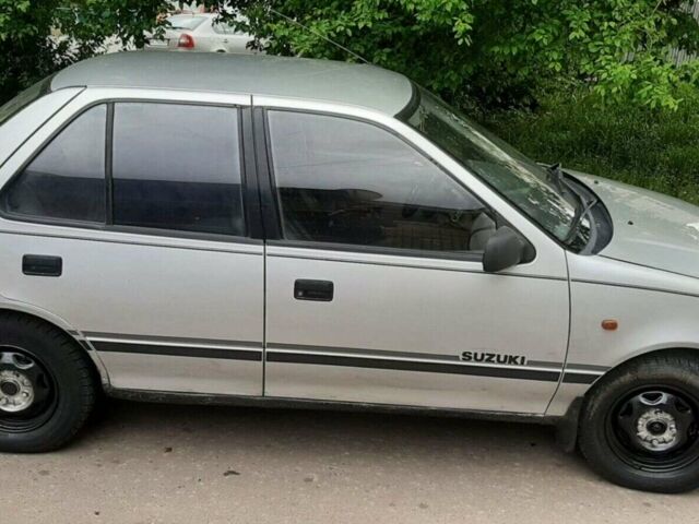 Серый Сузуки Свифт, объемом двигателя 1.3 л и пробегом 290 тыс. км за 1600 $, фото 14 на Automoto.ua