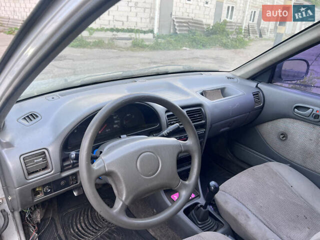 Серый Сузуки Свифт, объемом двигателя 1.3 л и пробегом 157 тыс. км за 800 $, фото 6 на Automoto.ua