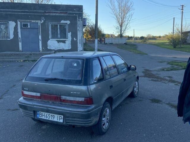 Серый Сузуки Свифт, объемом двигателя 1 л и пробегом 24 тыс. км за 900 $, фото 3 на Automoto.ua