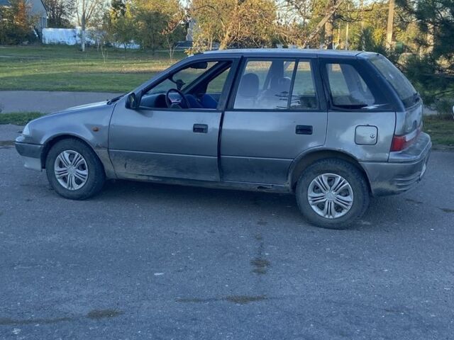 Серый Сузуки Свифт, объемом двигателя 1 л и пробегом 24 тыс. км за 900 $, фото 1 на Automoto.ua