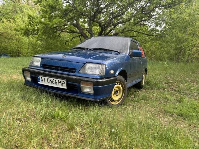 Синий Сузуки Свифт, объемом двигателя 1.3 л и пробегом 60 тыс. км за 1100 $, фото 1 на Automoto.ua