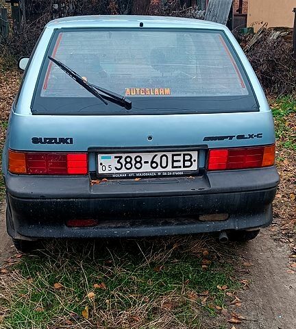 Синий Сузуки Свифт, объемом двигателя 1.3 л и пробегом 160 тыс. км за 750 $, фото 2 на Automoto.ua