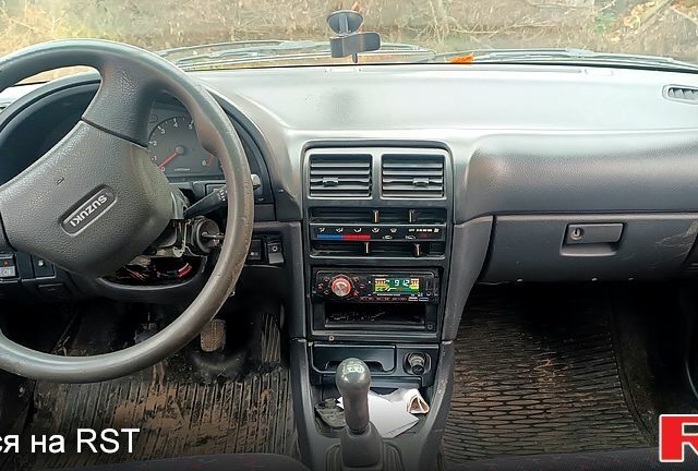 Синий Сузуки Свифт, объемом двигателя 1.3 л и пробегом 160 тыс. км за 750 $, фото 4 на Automoto.ua