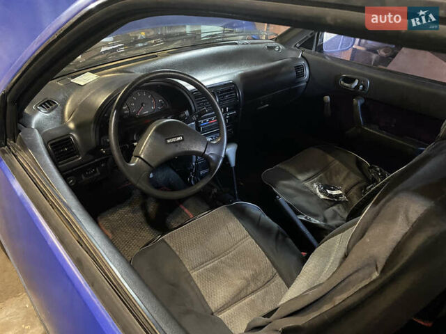 Синий Сузуки Свифт, объемом двигателя 1 л и пробегом 296 тыс. км за 1000 $, фото 9 на Automoto.ua