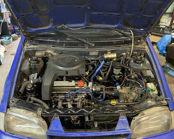 Синий Сузуки Свифт, объемом двигателя 1 л и пробегом 296 тыс. км за 1000 $, фото 4 на Automoto.ua