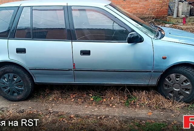 Синий Сузуки Свифт, объемом двигателя 1.3 л и пробегом 160 тыс. км за 750 $, фото 1 на Automoto.ua