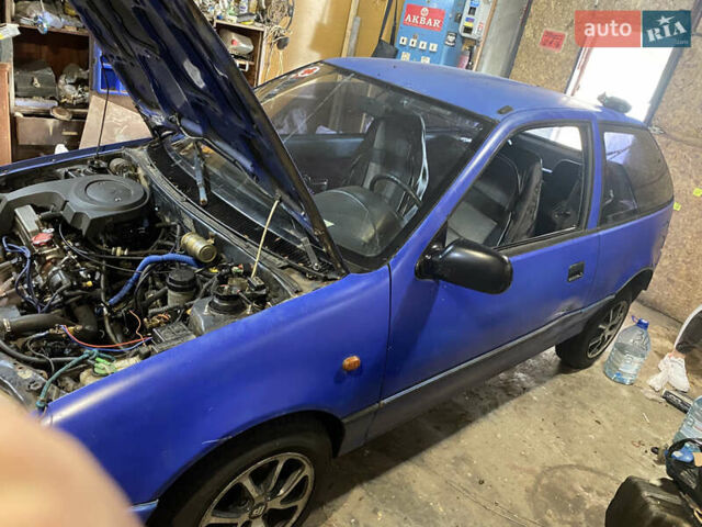 Синий Сузуки Свифт, объемом двигателя 1 л и пробегом 296 тыс. км за 1000 $, фото 6 на Automoto.ua