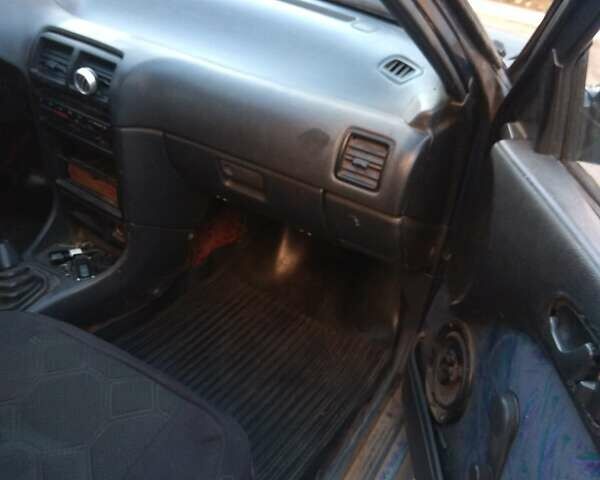 Синий Сузуки Свифт, объемом двигателя 1 л и пробегом 470 тыс. км за 1550 $, фото 1 на Automoto.ua