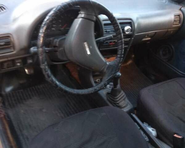 Синий Сузуки Свифт, объемом двигателя 1 л и пробегом 470 тыс. км за 1550 $, фото 3 на Automoto.ua