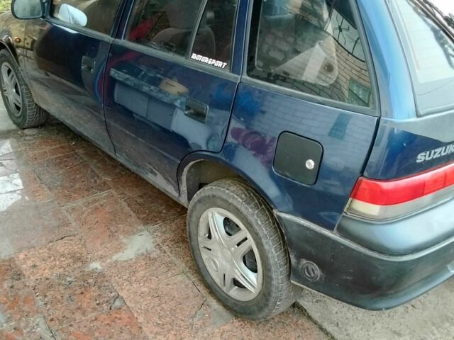 Синий Сузуки Свифт, объемом двигателя 1.3 л и пробегом 200 тыс. км за 2000 $, фото 2 на Automoto.ua