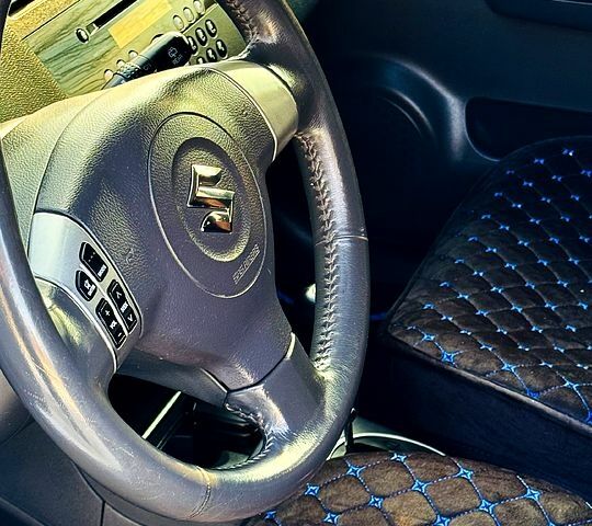 Синий Сузуки Свифт, объемом двигателя 1.5 л и пробегом 70 тыс. км за 8100 $, фото 7 на Automoto.ua