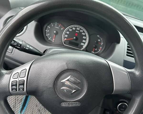 Синий Сузуки Свифт, объемом двигателя 1.33 л и пробегом 290 тыс. км за 4800 $, фото 6 на Automoto.ua