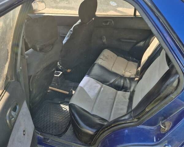 Синій Сузукі Свифт, об'ємом двигуна 1.3 л та пробігом 36 тис. км за 1200 $, фото 11 на Automoto.ua