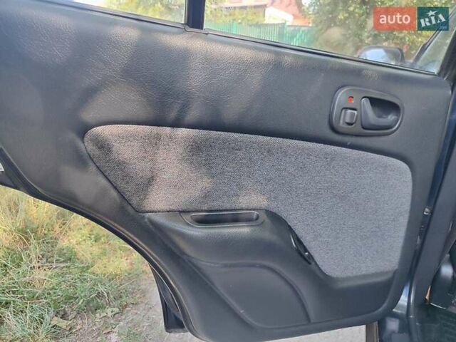 Синій Сузукі Свифт, об'ємом двигуна 1.59 л та пробігом 97 тис. км за 2300 $, фото 1 на Automoto.ua