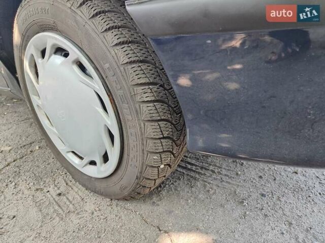 Синій Сузукі Свифт, об'ємом двигуна 1.59 л та пробігом 97 тис. км за 2300 $, фото 21 на Automoto.ua