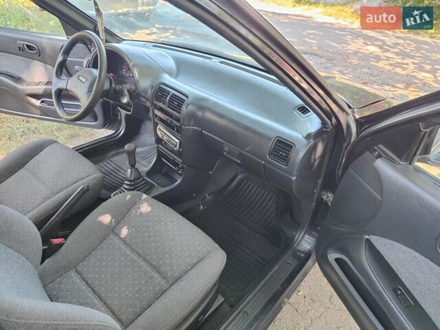 Синій Сузукі Свифт, об'ємом двигуна 1.59 л та пробігом 97 тис. км за 2300 $, фото 12 на Automoto.ua