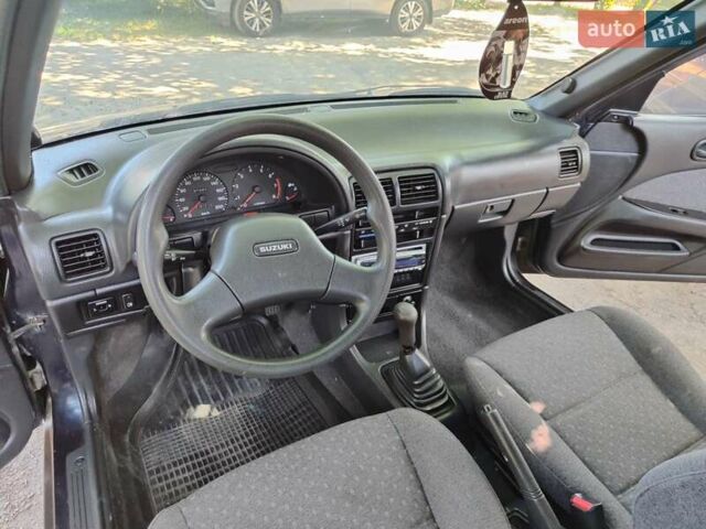Синій Сузукі Свифт, об'ємом двигуна 1.59 л та пробігом 97 тис. км за 2300 $, фото 3 на Automoto.ua