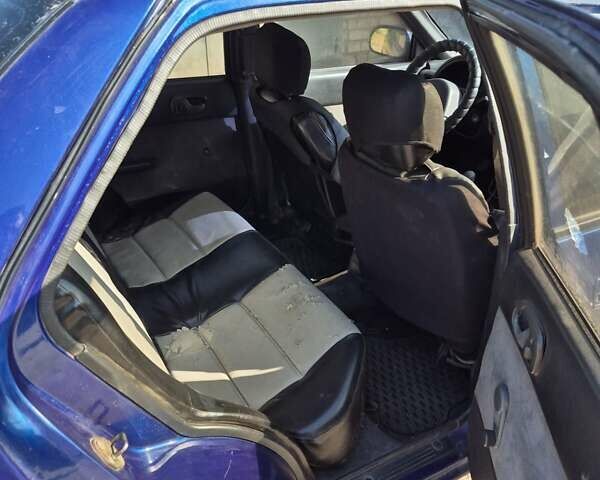 Синій Сузукі Свифт, об'ємом двигуна 1.3 л та пробігом 36 тис. км за 1200 $, фото 12 на Automoto.ua