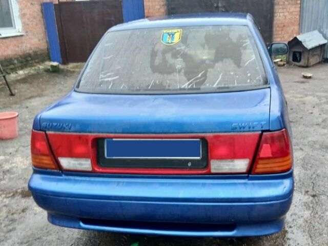 Синий Сузуки Свифт, объемом двигателя 1.3 л и пробегом 91 тыс. км за 1400 $, фото 2 на Automoto.ua