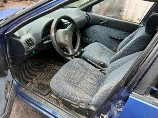 Синій Сузукі Свифт, об'ємом двигуна 1.3 л та пробігом 91 тис. км за 1670 $, фото 4 на Automoto.ua