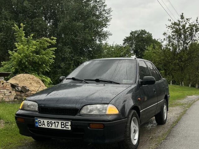 Синий Сузуки Свифт, объемом двигателя 1.3 л и пробегом 250 тыс. км за 1200 $, фото 2 на Automoto.ua