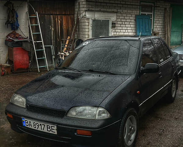 Синій Сузукі Свифт, об'ємом двигуна 1.3 л та пробігом 140 тис. км за 1800 $, фото 10 на Automoto.ua