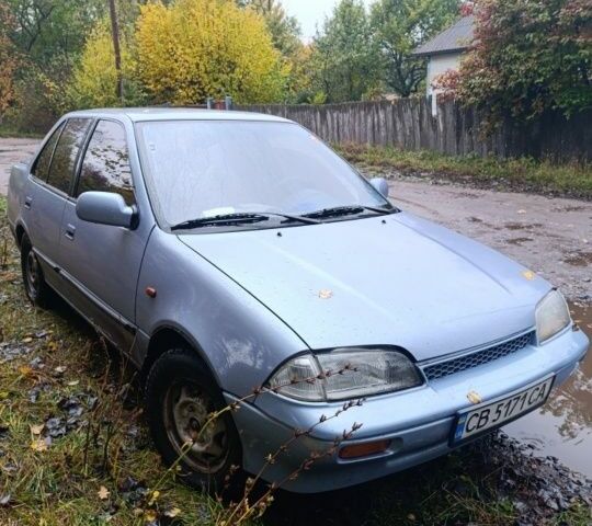 Синий Сузуки Свифт, объемом двигателя 1.3 л и пробегом 150 тыс. км за 834 $, фото 2 на Automoto.ua