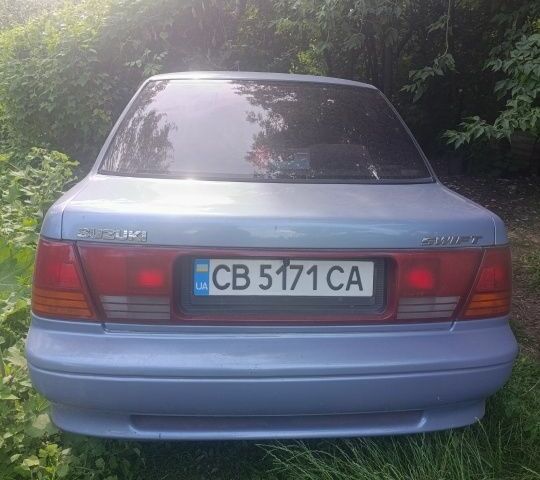 Синий Сузуки Свифт, объемом двигателя 1.3 л и пробегом 150 тыс. км за 834 $, фото 5 на Automoto.ua