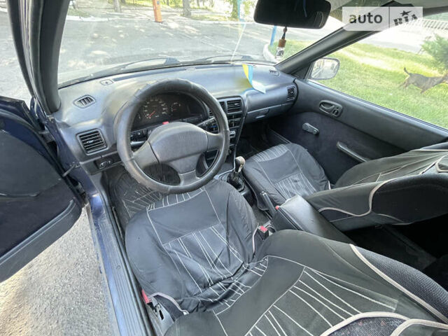 Синий Сузуки Свифт, объемом двигателя 1.3 л и пробегом 255 тыс. км за 1100 $, фото 4 на Automoto.ua