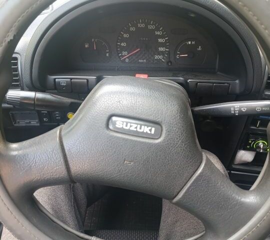 Синий Сузуки Свифт, объемом двигателя 1.3 л и пробегом 150 тыс. км за 834 $, фото 9 на Automoto.ua