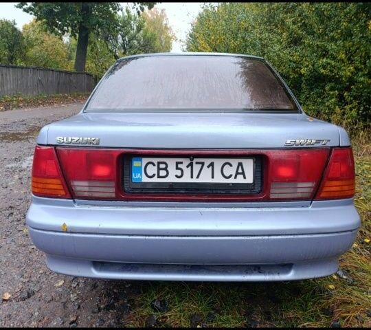 Синий Сузуки Свифт, объемом двигателя 1.3 л и пробегом 150 тыс. км за 834 $, фото 3 на Automoto.ua