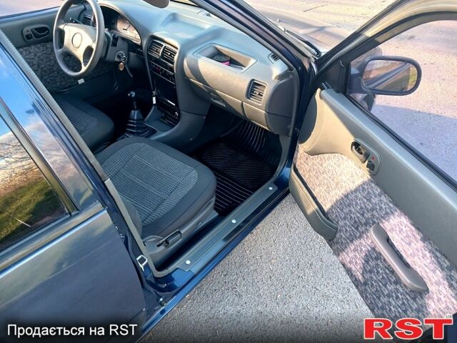 Синій Сузукі Свифт, об'ємом двигуна 1.3 л та пробігом 92 тис. км за 1650 $, фото 6 на Automoto.ua