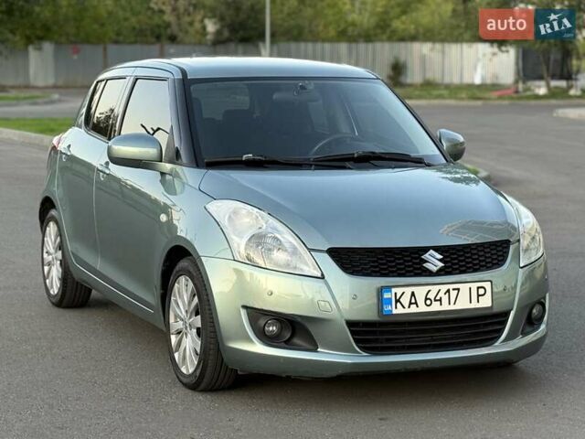 Зелений Сузукі Свифт, об'ємом двигуна 1.2 л та пробігом 138 тис. км за 8700 $, фото 1 на Automoto.ua