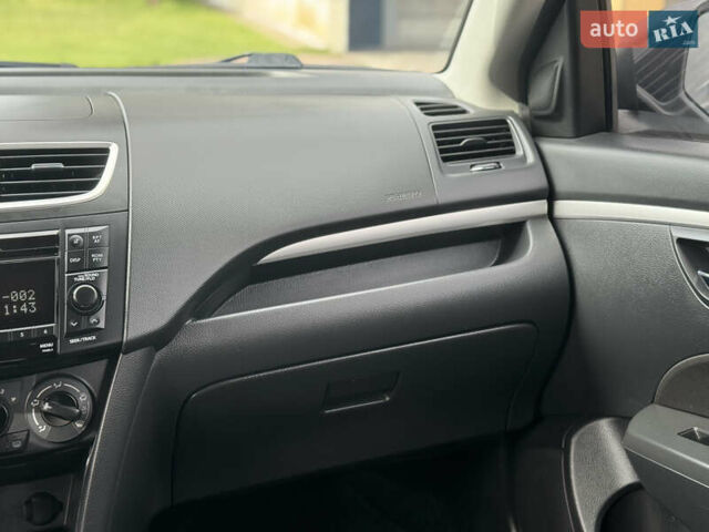 Зелений Сузукі Свифт, об'ємом двигуна 1.24 л та пробігом 110 тис. км за 8499 $, фото 25 на Automoto.ua