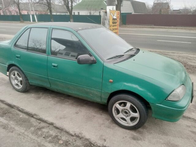 Зелений Сузукі Свифт, об'ємом двигуна 1.3 л та пробігом 300 тис. км за 850 $, фото 2 на Automoto.ua