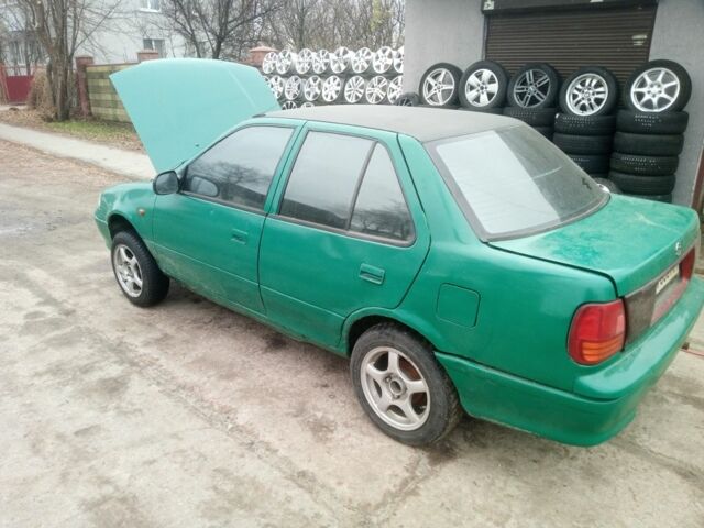 Зелений Сузукі Свифт, об'ємом двигуна 1.3 л та пробігом 300 тис. км за 850 $, фото 6 на Automoto.ua