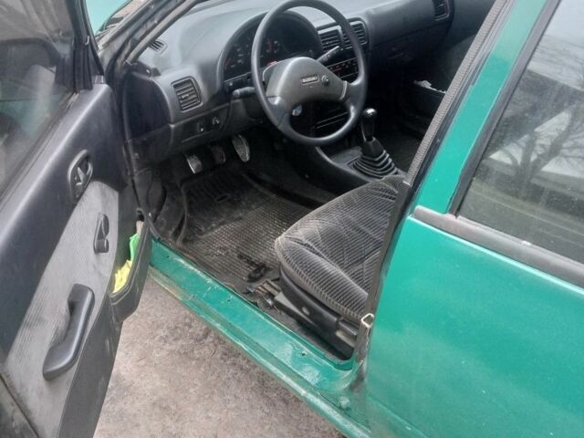 Зелений Сузукі Свифт, об'ємом двигуна 1.3 л та пробігом 300 тис. км за 850 $, фото 8 на Automoto.ua