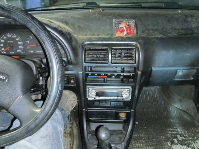 Зеленый Сузуки Свифт, объемом двигателя 1.6 л и пробегом 70 тыс. км за 850 $, фото 11 на Automoto.ua