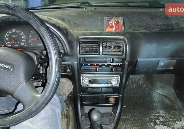 Зеленый Сузуки Свифт, объемом двигателя 1.6 л и пробегом 70 тыс. км за 850 $, фото 10 на Automoto.ua