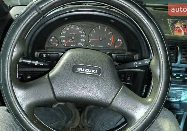 Зеленый Сузуки Свифт, объемом двигателя 1.6 л и пробегом 70 тыс. км за 850 $, фото 9 на Automoto.ua