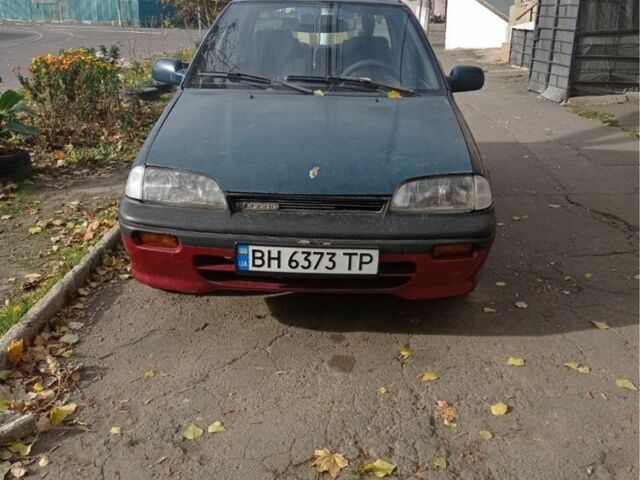 Зелений Сузукі Свифт, об'ємом двигуна 1.3 л та пробігом 427 тис. км за 700 $, фото 1 на Automoto.ua