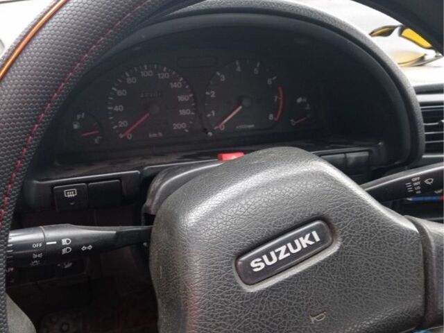 Зелений Сузукі Свифт, об'ємом двигуна 1.3 л та пробігом 427 тис. км за 700 $, фото 7 на Automoto.ua