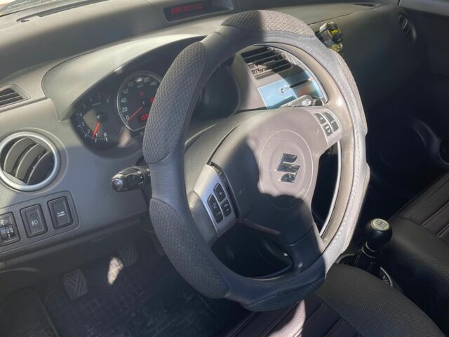 Помаранчевий Сузукі Свифт, об'ємом двигуна 1.3 л та пробігом 159 тис. км за 4500 $, фото 11 на Automoto.ua