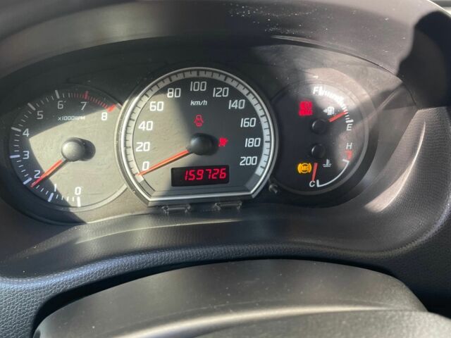 Помаранчевий Сузукі Свифт, об'ємом двигуна 1.3 л та пробігом 159 тис. км за 4500 $, фото 10 на Automoto.ua