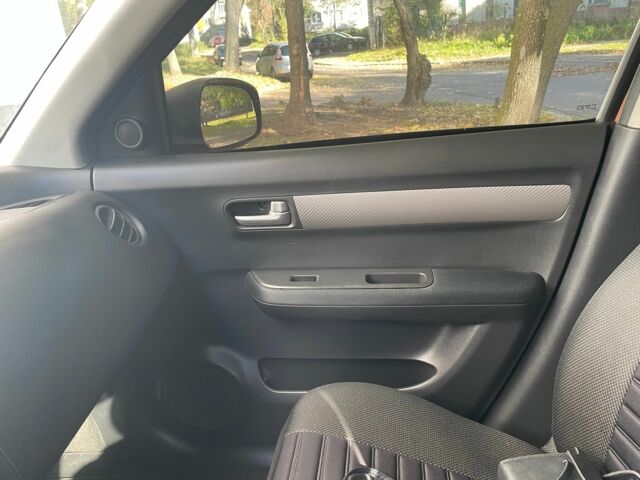 Помаранчевий Сузукі Свифт, об'ємом двигуна 1.3 л та пробігом 159 тис. км за 4500 $, фото 9 на Automoto.ua